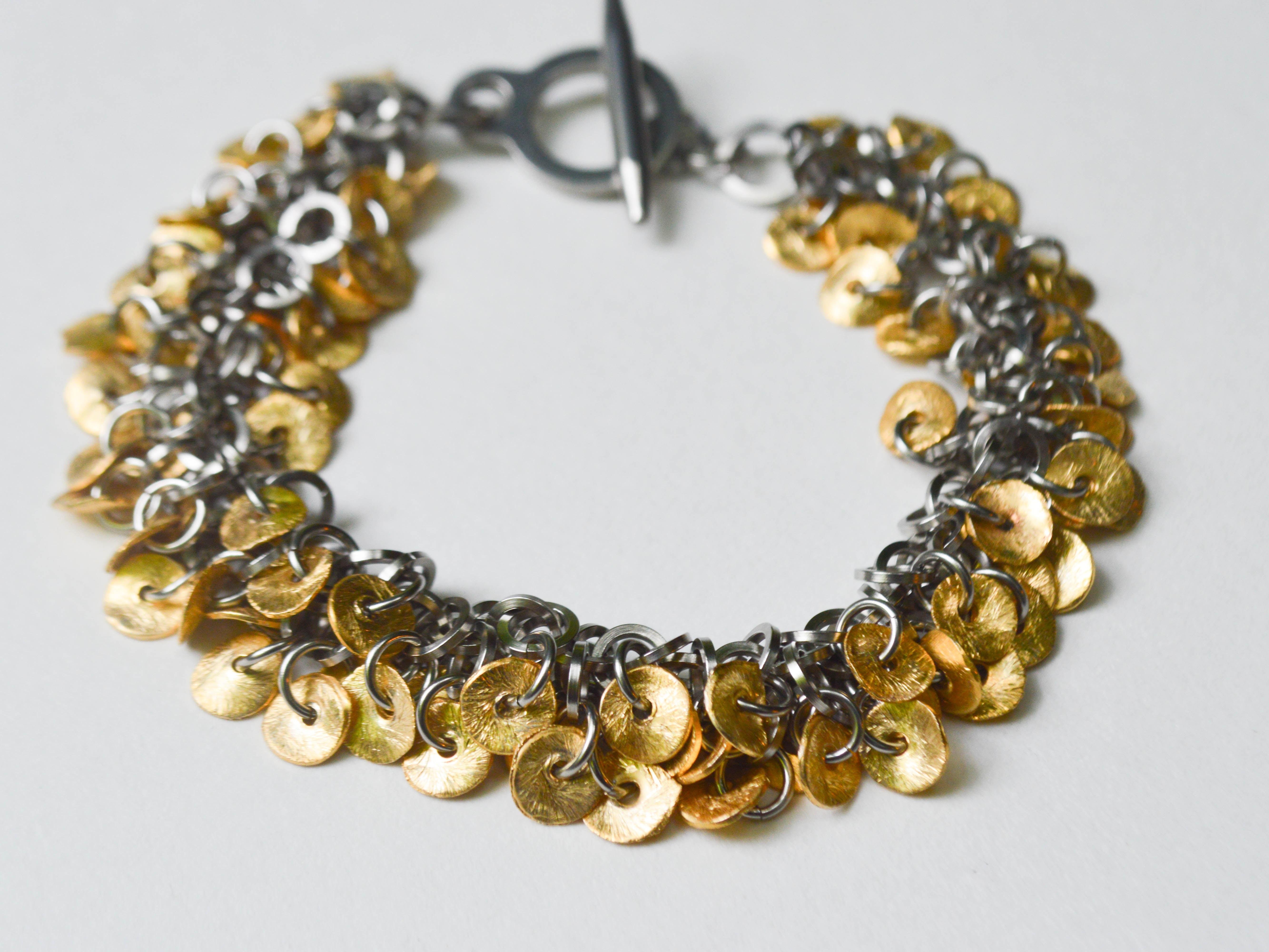 Stainless Steel Bracelet with Gold Dangles